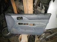 Обшивка двери передней правой Mitsubishi Lancer IX 2000 - 2010