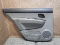 Обшивка двери задней левой Kia Carens II 2006 - 2012