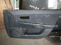 Обшивка двери передней правой Mazda 3 I [BK] 2003 - 2009