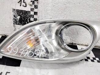 Рамка фары противотуманой левой Mazda CX-7 2006 - 2012