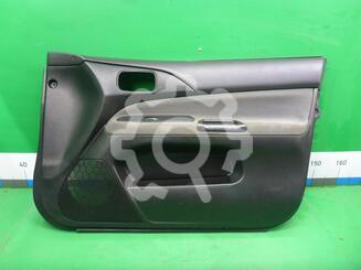 Обшивка двери передней правой Mitsubishi Lancer IX 2000 - 2010
